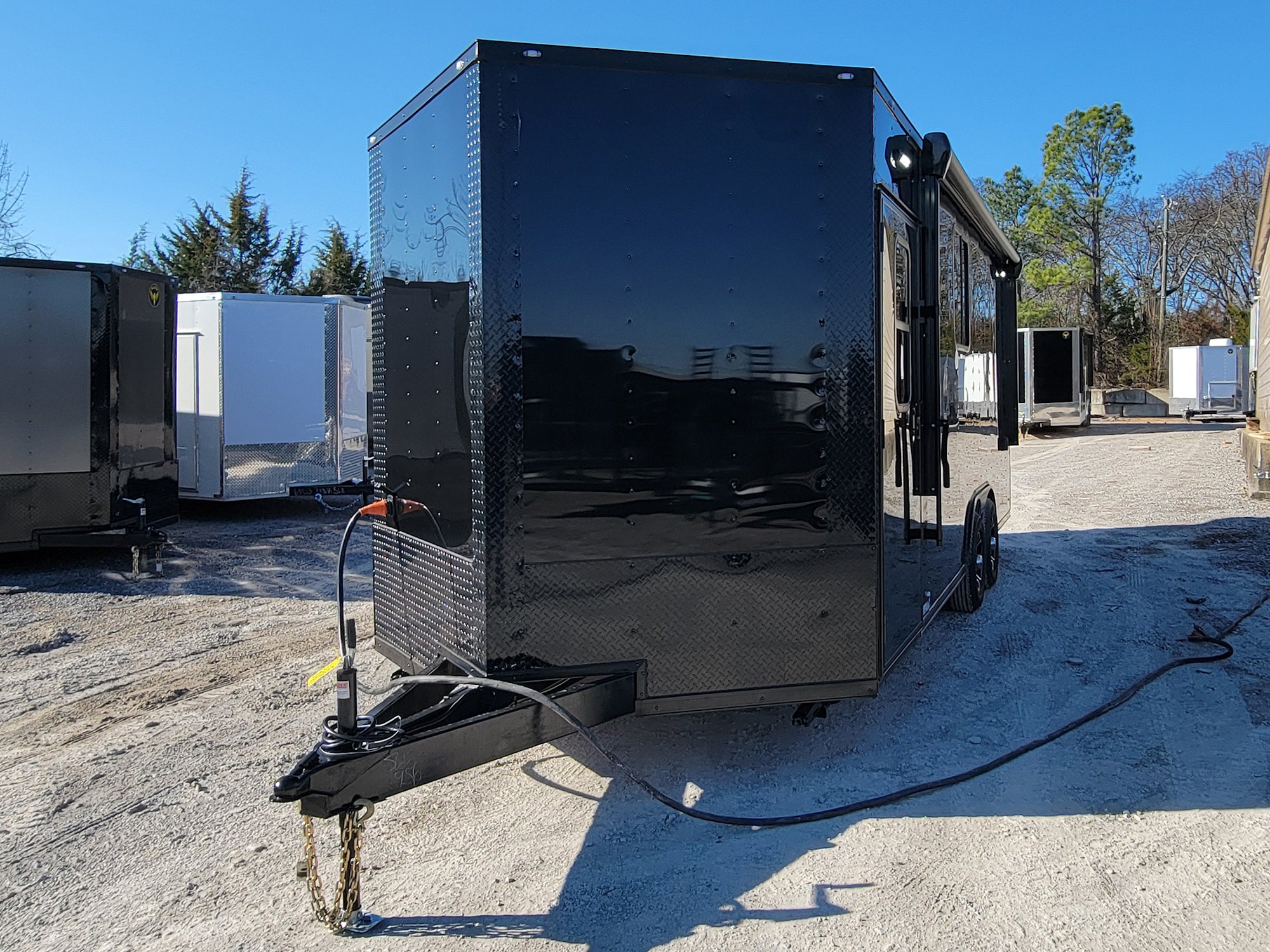 8.5′ X 20′ Black With Blackout Office and Command Center Enclosed Trailer